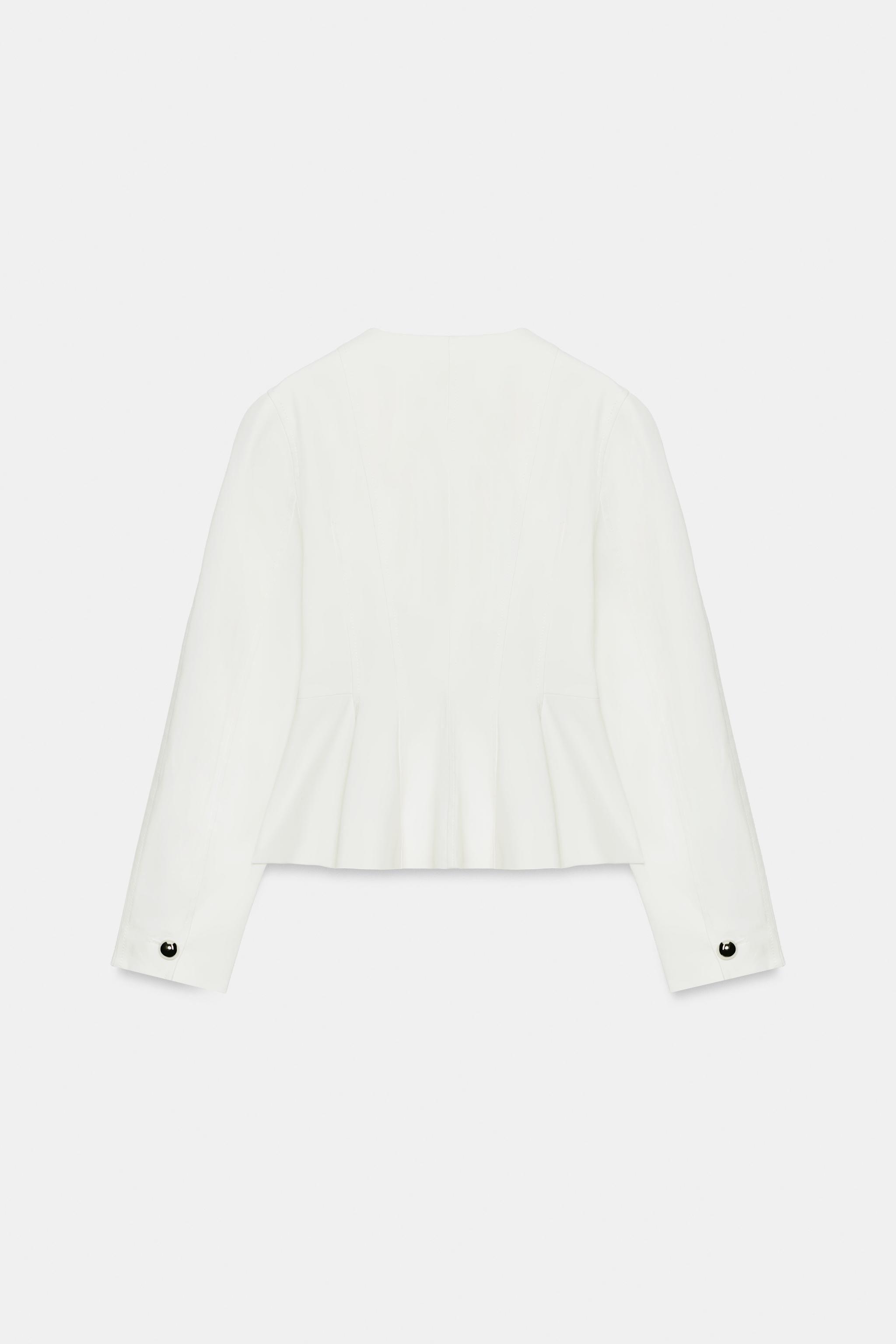 VESTE PEPLUM BOUTONS MÉTALLIQUES
